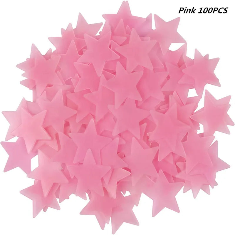A pile of pink glow in the dark 3D star wall decals
