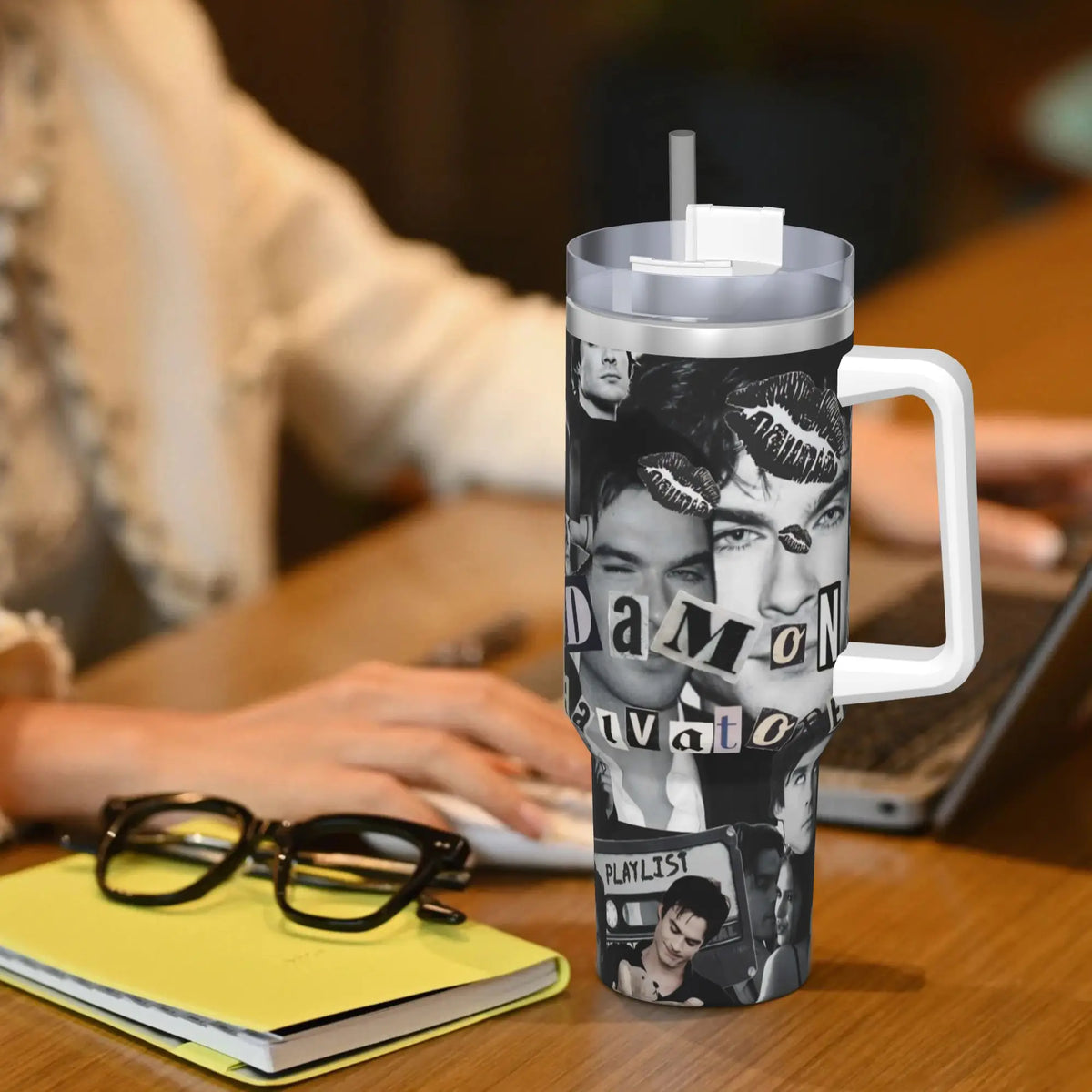 A clear stainless steel tumbler with a black and white graphic featuring a close-up of a man's face.