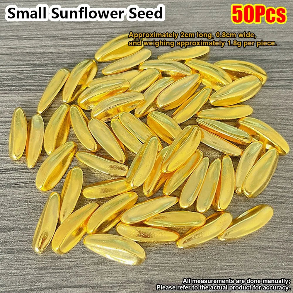 A pile of small, elongated, golden sunflower seeds for decoration.