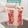 Hands are holding a red coral fleece cleaning cloth under a faucet for cleaning.