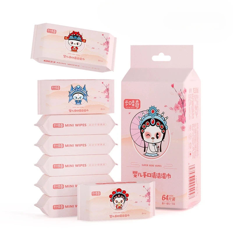A collection of pink and white portable mini wipes packaged in cardboard boxes for hygiene.