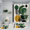A shower curtain featuring a modern botanical pattern of large green and black leaves and yellow circles.