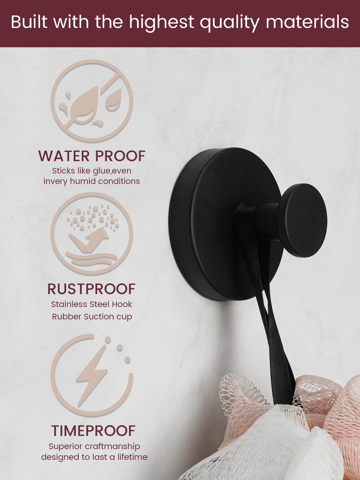 A black stainless steel suction cup towel rack with a flexible cord, shown against a light background.