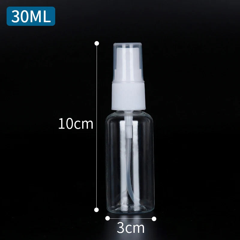 A clear glass bottle with a white spray top and a glass pipette inside, labeled as a 30ML refillable portable spray bottle.