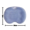 A light blue reusable silicone foot scrub brush with a textured surface and oval shape.