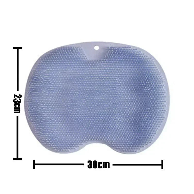 A light blue reusable silicone foot scrub brush with a textured surface and oval shape.
