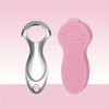 A stainless steel tongue scraper and its pink protective case are shown against a light pink background.