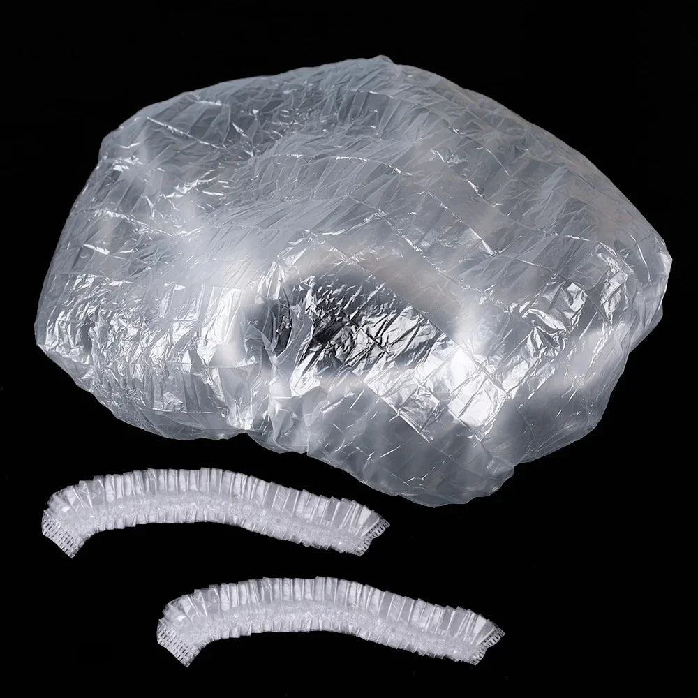 A clear, reusable disposable shower cap for hair protection shown in various forms.