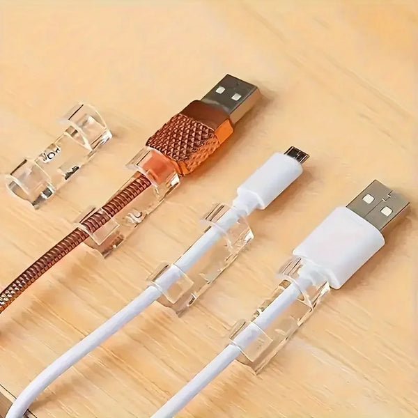 Clear adhesive cable clips with USB connectors for desk and wall organization