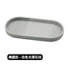 A rectangular silicone tray organizer in light gray.