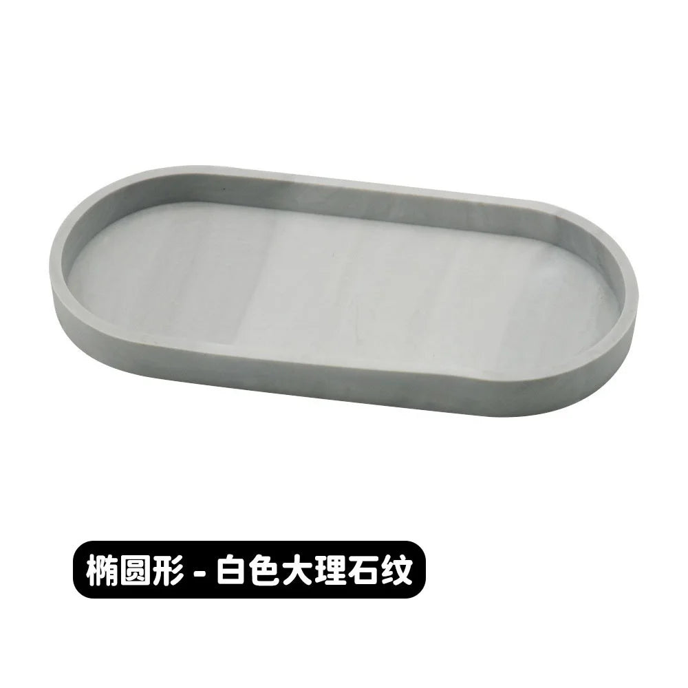 A rectangular silicone tray organizer in light gray.