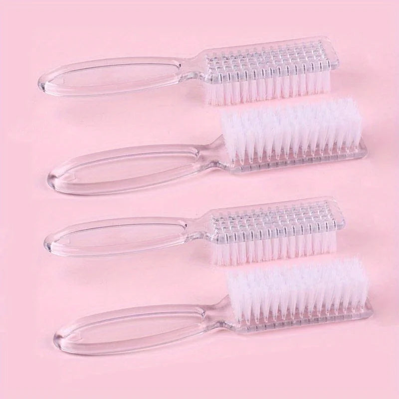 A set of four clear plastic brushes with silicone handles and various bristles for nail art and dust cleaning.