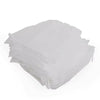 A stack of white disposable sink drain filter bags.