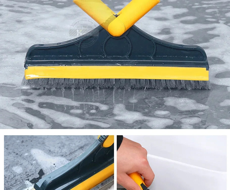 A yellow and black 2-in-1 floor scrub brush is shown cleaning a wet, speckled surface.
