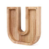 Piggy bank in wood shaped like the letter U for savings.