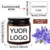 A dark glass jar with a black lid featuring a custom logo and labeled for blue wind chime customization.