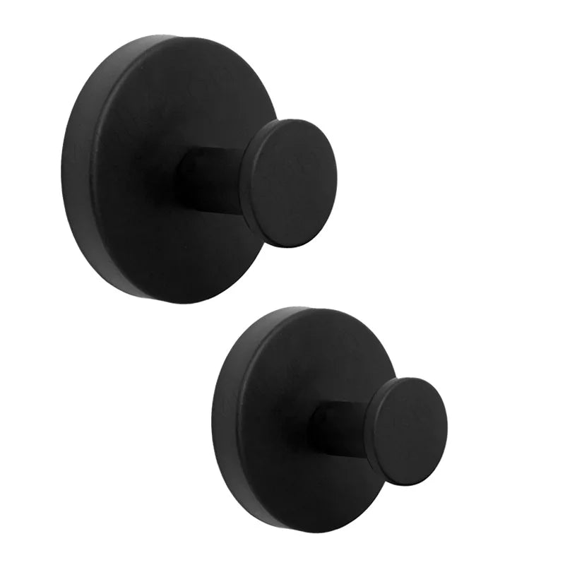 A black stainless steel suction cup towel rack with a round mounting plate.