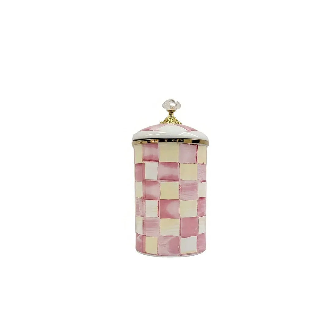 Retro enamel storage jar with a pink and cream checkered pattern and a gold lid
