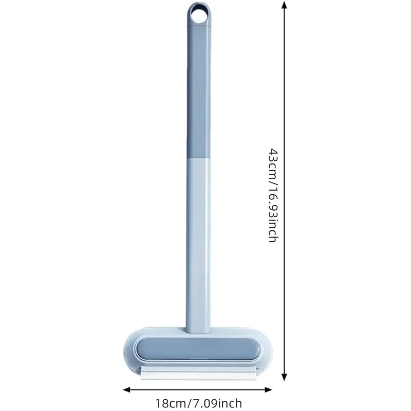 A light blue reusable multi-surface pet hair remover tool shown in a vertical orientation.