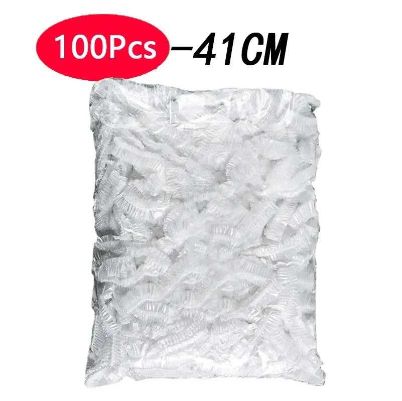 A clear plastic bag containing 100 pieces of reusable disposable shower caps for food storage.