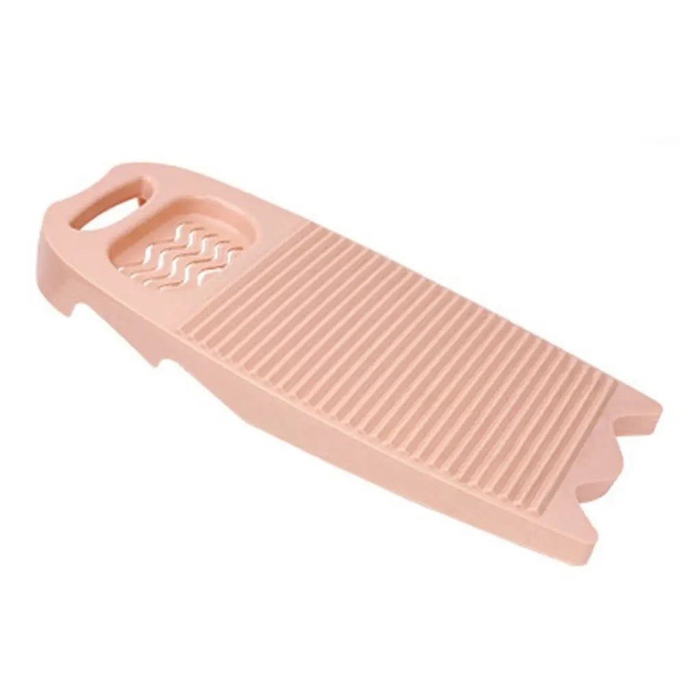 A pink durable plastic washing board designed for laundry.
