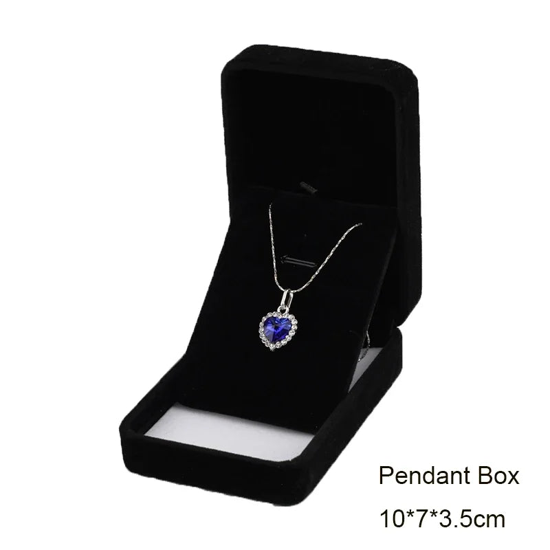 Elegant black velvet jewelry storage box with a removable insert for storing pendants and jewelry