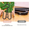 Black plastic wig hangers showing stretch without deformation and thickening and bolding features