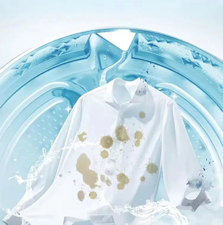 White shirt with gold laundry beads and water droplets against a light blue background.