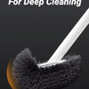 A close-up view of an elevated head design toilet brush with a long handle for deep cleaning.