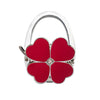 Silver foldable handbag hook with a heart-shaped red charm.