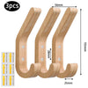 Three natural oak wood wall hooks with integrated screws shown in various angles and dimensions