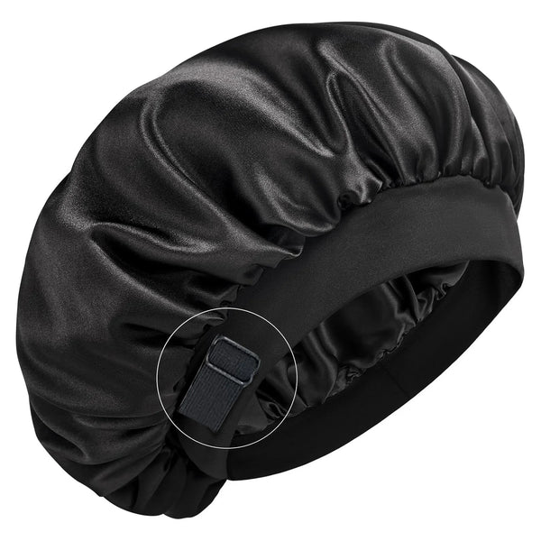 A black silk sleep cap with a wide elastic band is shown from above.
