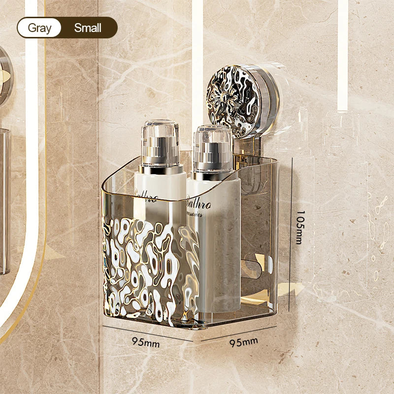 Stainless steel suction cup storage rack with glass bottles and a brush on a bathroom surface