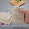 A beige cotton crochet soap bag pouch set shown next to a wooden tray and a hand for scale.