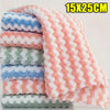 A stack of pink, blue, and green coral fleece cleaning cloths, measuring 15x25cm.