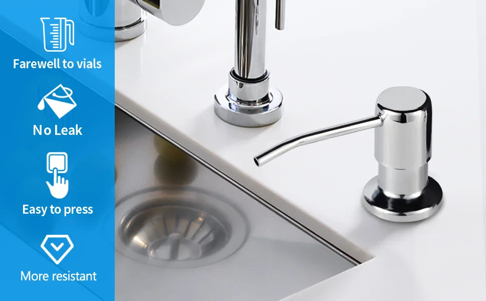A close-up of a modern stainless steel under-sink kitchen soap dispenser with a chrome faucet and a circular dish.