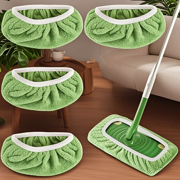 Four reusable green mop pads with white handles and a green mop are shown for enhanced cleaning.
