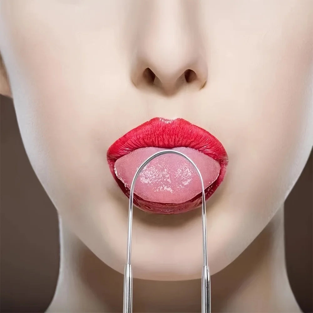 A close-up of a woman's mouth showing bright red lips and tongue being scraped with a stainless steel tongue scraper.