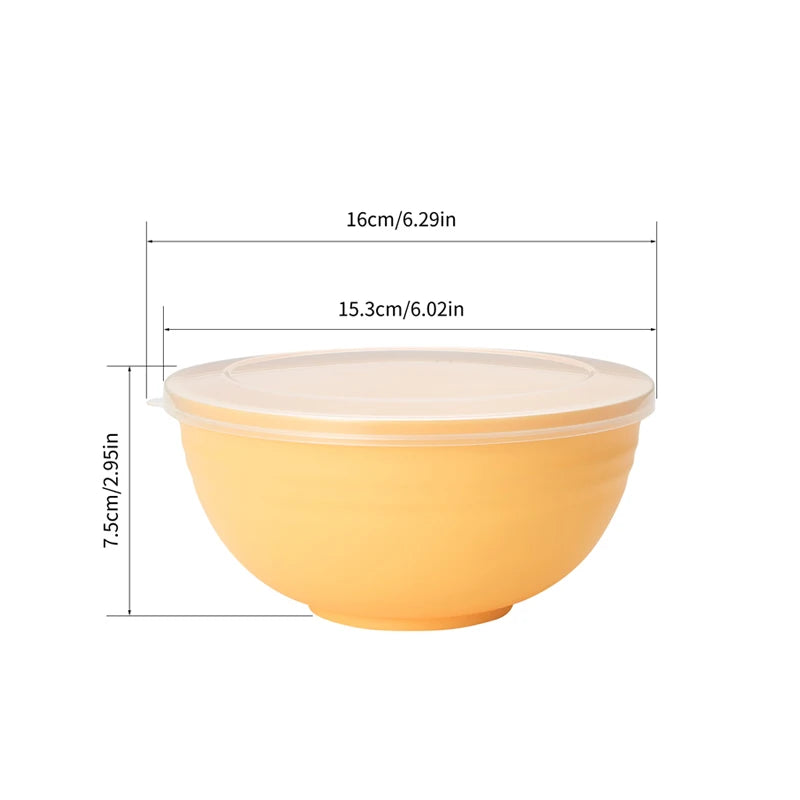 An orange reusable food storage bowl with a clear sealing lid, shown from the side.
