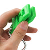 A hand is holding a bright green durable glove clip with an ergonomic buckle for work safety.