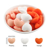 A bowl filled with 10 silicone heart-shaped beads in peach, white, and orange colors.