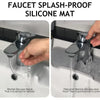A close-up of a faucet splash-proof silicone mat preventing water from splashing onto a countertop.