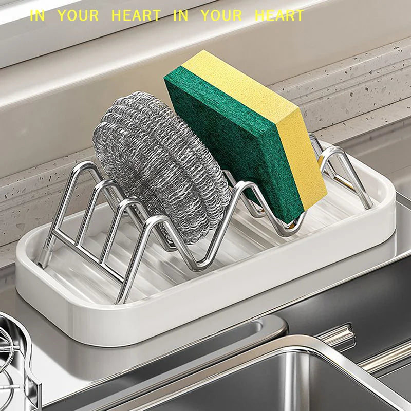 W-shaped stainless steel soap storage rack holding green and yellow bar soap.
