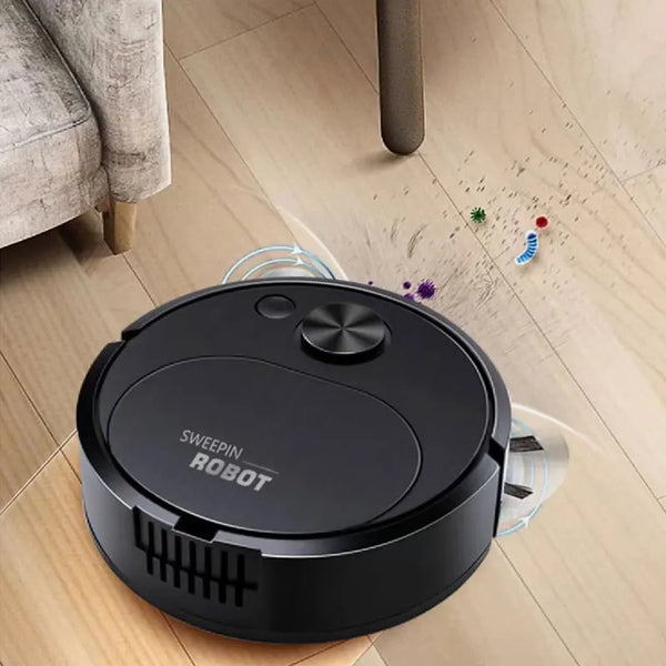 A black sweeper robot vacuum cleaner is shown on a light wooden floor.
