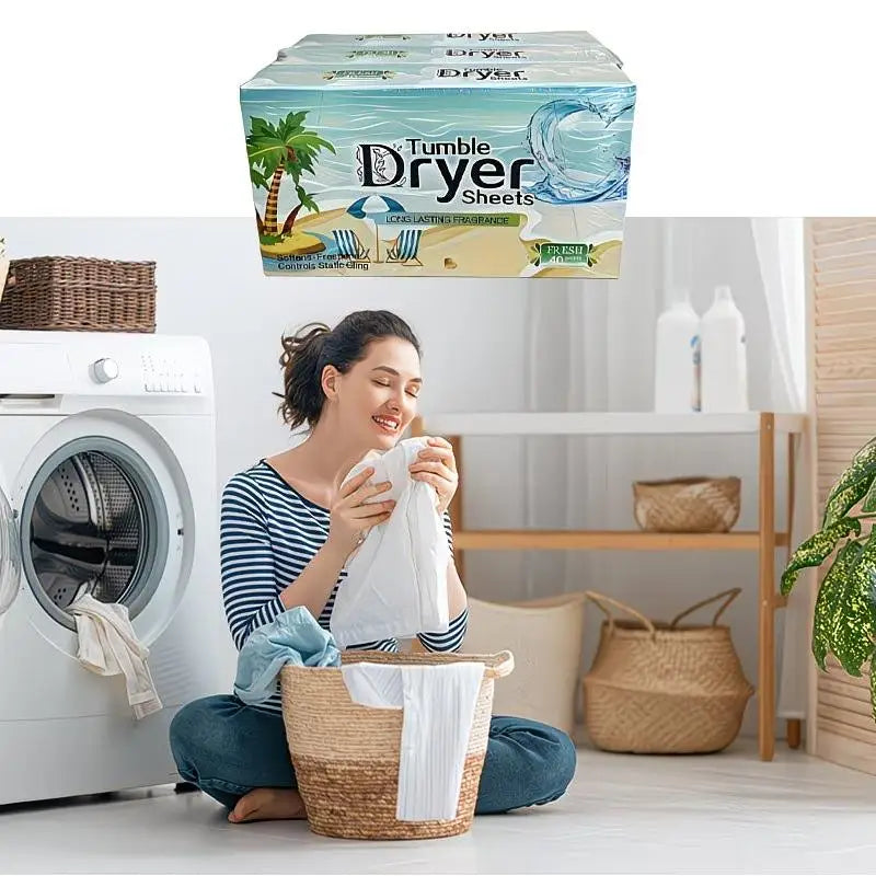 A woman sits in front of a washing machine with a box of Tumble Dryer Sheets and woven baskets.