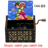 A wooden musical tone box featuring an anime character, labeled 144-B9.