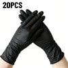 A pair of black disposable nitrile cleaning gloves are shown folded together.