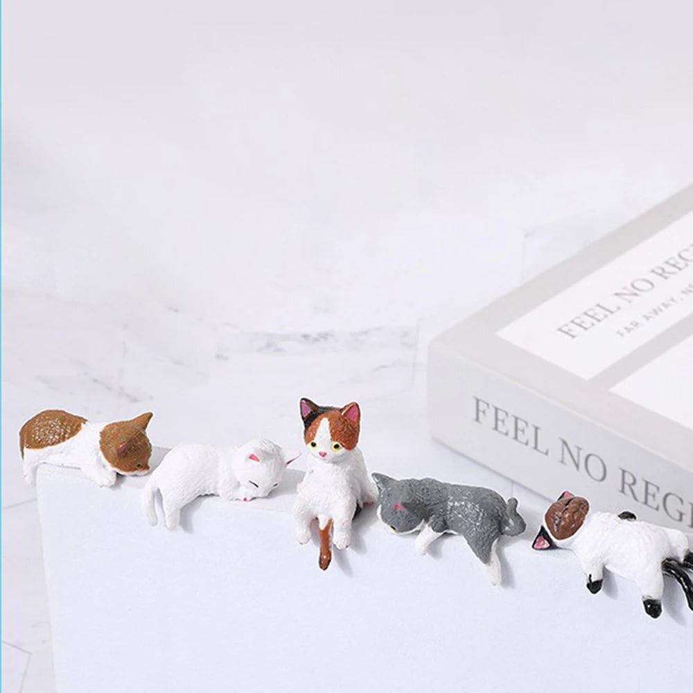 A set of cute healing cat figurines featuring various breeds and colors on a white background.
