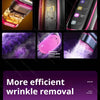 A handheld garment steamer iron in pink and black, shown with various attachments and features.
