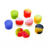 A collection of colorful, round silicone storage jars in shades of green, orange, red, yellow, and blue.